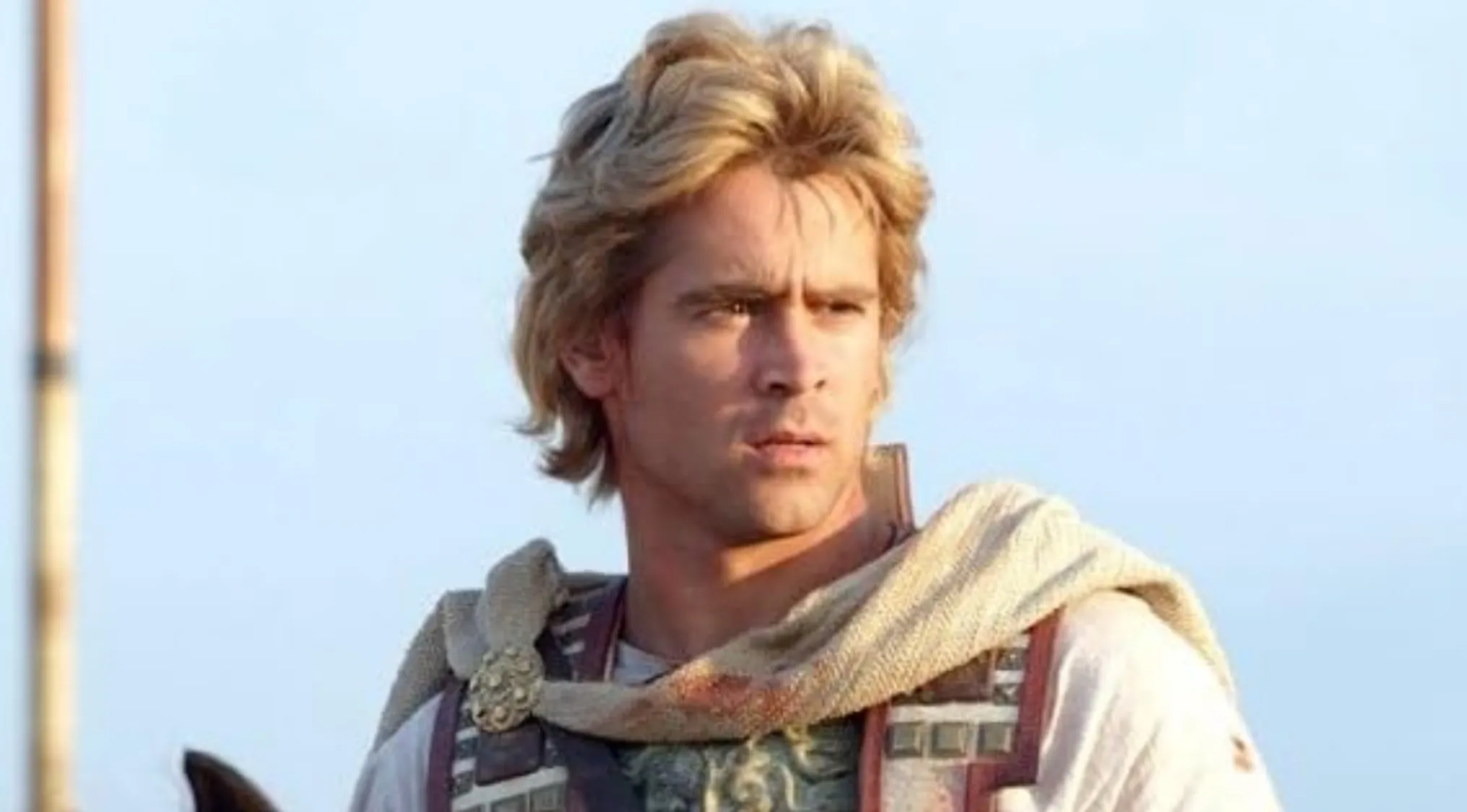 A film still of a man with blonde hair in period costume, representing a historic figure.