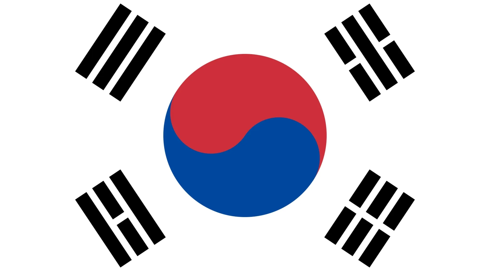 The flag of South Korea, featuring a white background, a red and blue Taeguk in the center, and four black trigrams. Guess the country!