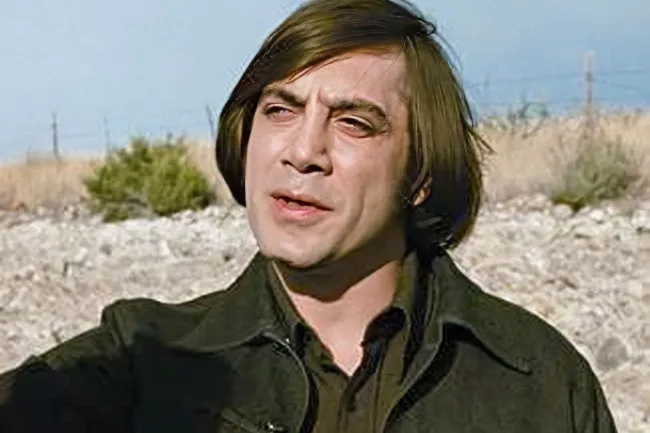 A close-up of Anton Chigurh, a movie villain, staring intensely into the distance for a villain-themed birthday.