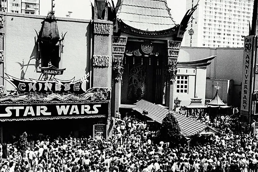 A crowd gathers outside Mann's Chinese Theatre for the Star Wars movie premiere.