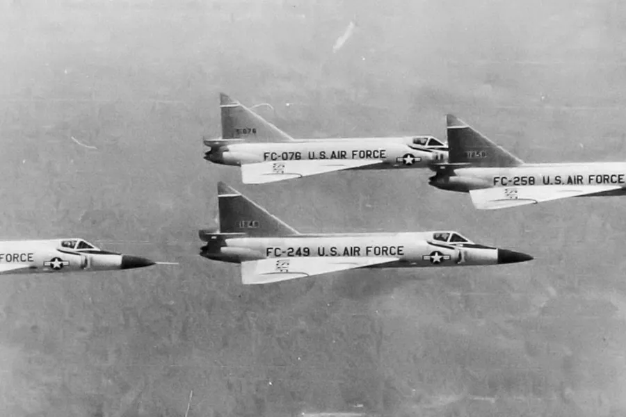 Black and white photo of four U.S. Air Force fighter jets flying in formation during the Cuban Missile Crisis.