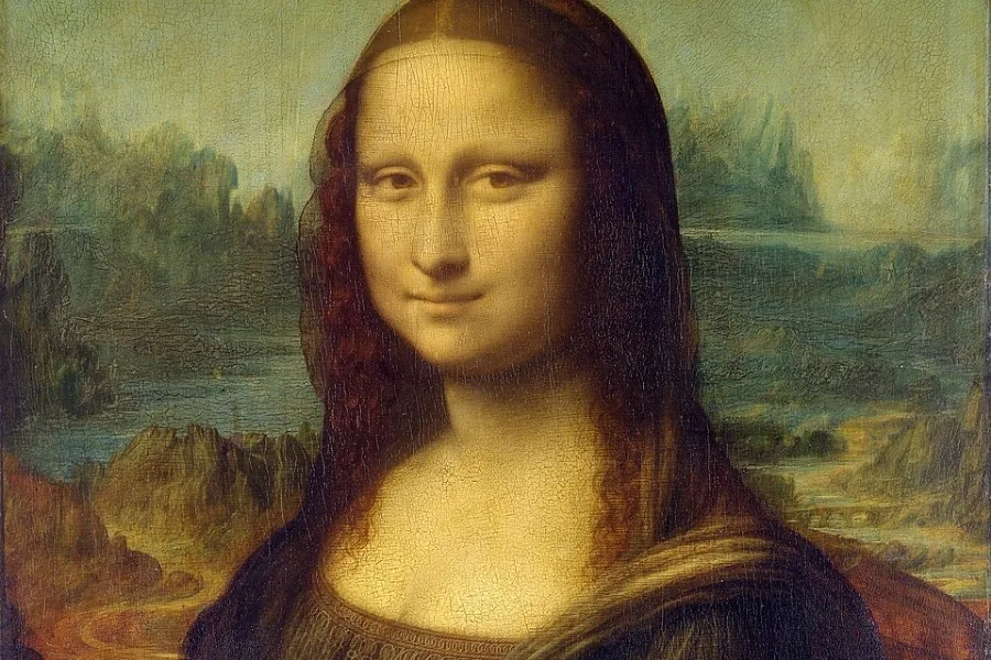 Close-up of the Mona Lisa painting by Leonardo da Vinci, featuring a woman with a subtle smile.