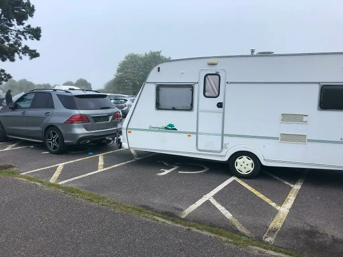 Parked In Four Spots At Once, Three Of Which Were Handicapped