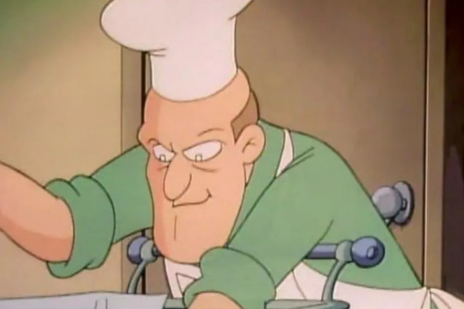 An animated chef with a white hat and green apron, smiling mischievously while cooking. Which character?