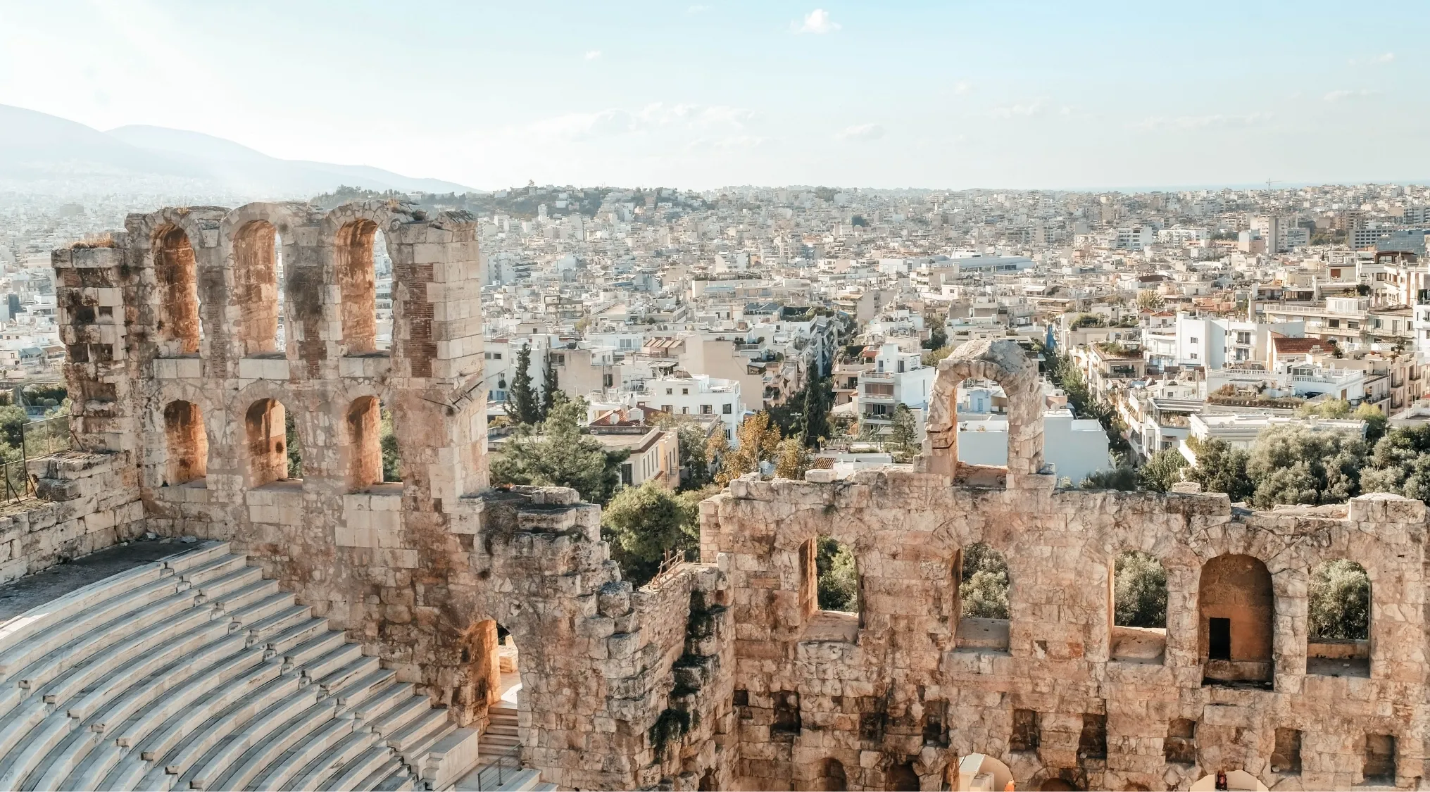 Ruins of an ancient amphitheater in Athens, Greece, showcasing the historical entertainment venue.