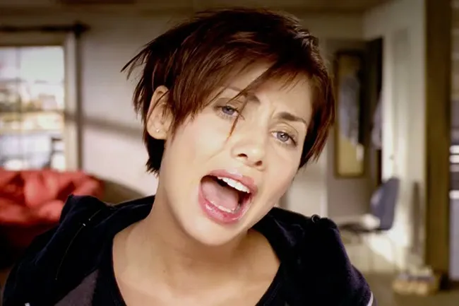 Natalie Imbruglia with an open mouth, a song that matches a current mental state of feeling torn.