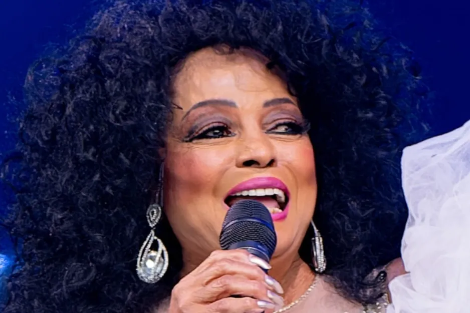 Diana Ross, known as the Queen of Soul, singing with a microphone.