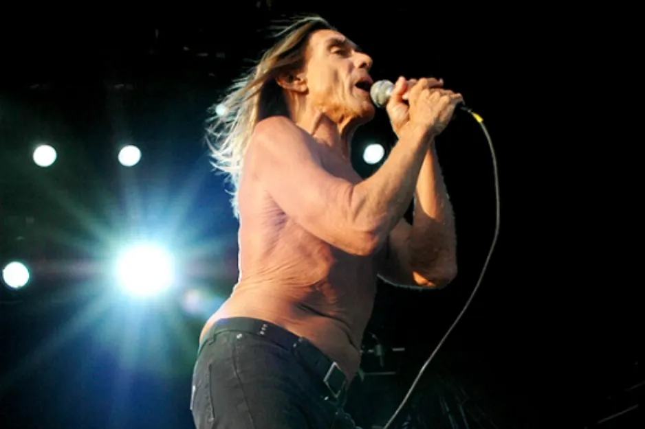 Iggy Pop performing live, a singer known for the alter ego Ziggy Stardust.