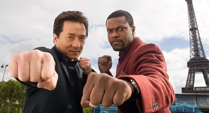 Jackie Chan and Chris Tucker in a fighting stance, challenging myths about men and women.