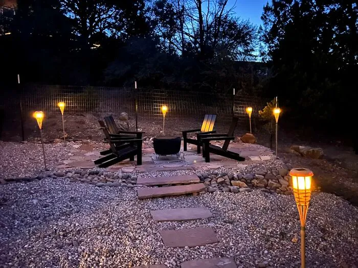 Backyard Vibes After Dark Get A Serious Upgrade When A Row Of <a Style="Display:inline;" Href="Https://Www.amazon.com/Evelynsun-Torch-Solar-Lights-Outdoor/Dp/B0bq6twvmz?ie=utf8&th=1&linkcode=ll2&tag=bpcorgi-20&linkid=aa6122ed08c4e97d9293378d6fcac698&language=en_us&ref_=as_li_ss_tl" Target="_blank">  <span Style="Font: Inherit; Color: #d74b1f;"> Solar Tiki Torches </Span> Handles All The Ambiance Without A Single Extension Cord Or Lighter In Sight