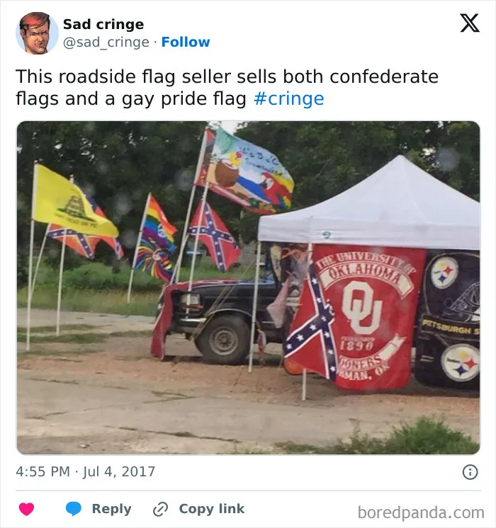 A roadside flag seller booth displaying both Confederate flags and a rainbow pride flag, a cringy mix of ideologies.