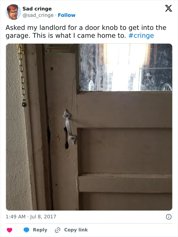 A cringy image of a garage door with a makeshift door handle, highlighting a sad situation.