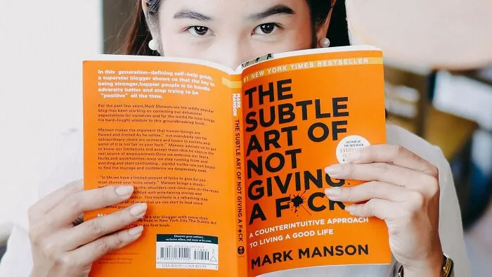 On your third date, you talk about some of the problems you’re facing in life. Your date keeps interrupting with some unsolicited advice, but it comes off as them genuinely wanting to help. Afterward, they explain that self-help books helped them deal with exactly these sorts of problems, and offer to lend you 3 of their favorites.