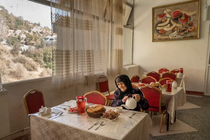 Overall Winner: A Woman Eats In The Canteen Of The Soviet-Era Sanatorium By Jo Kearney, United Kingdom