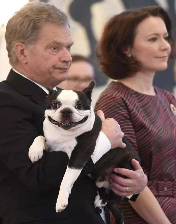 President Sauli Niinisto Of Finland, With His Wife, Jenni Haukio, And Their Dog, Lennu
