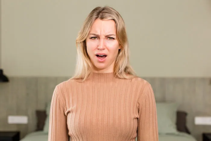 A woman with a confused expression, highlighting myths about women.
