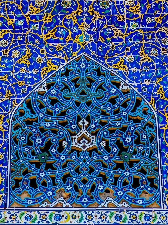 Close-up of Persian tile patterns in blue with geometric design