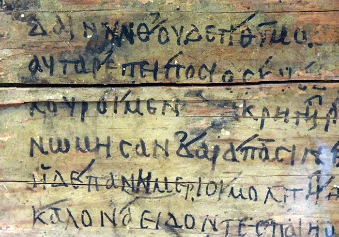 Ancient wooden tablet with old script writing cool facts