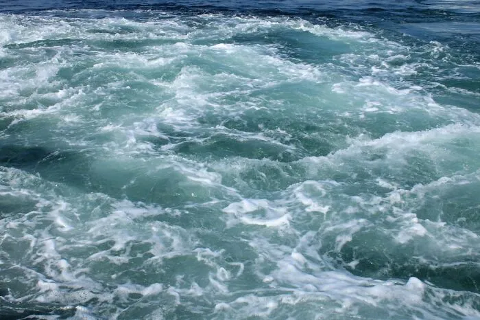 Turbulent ocean water surface for diving scene