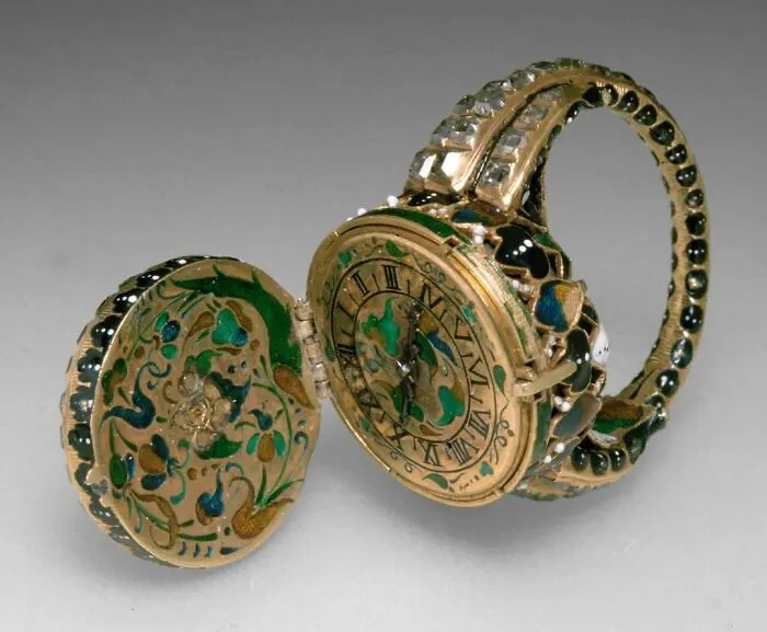 A gold and enamel ring watch, one of the interesting objects that are still intact after all these years.