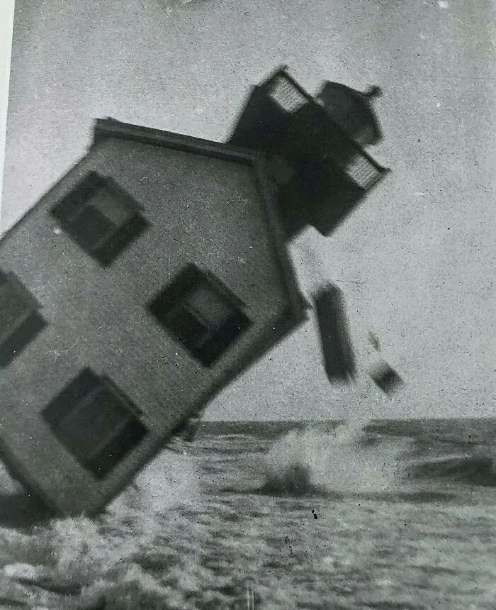 Vintage photo of a house falling into the sea, an interesting photo of intact objects.
