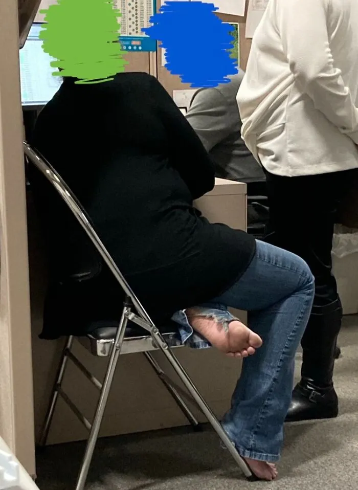 Coworker Walks Around The Office Barefoot