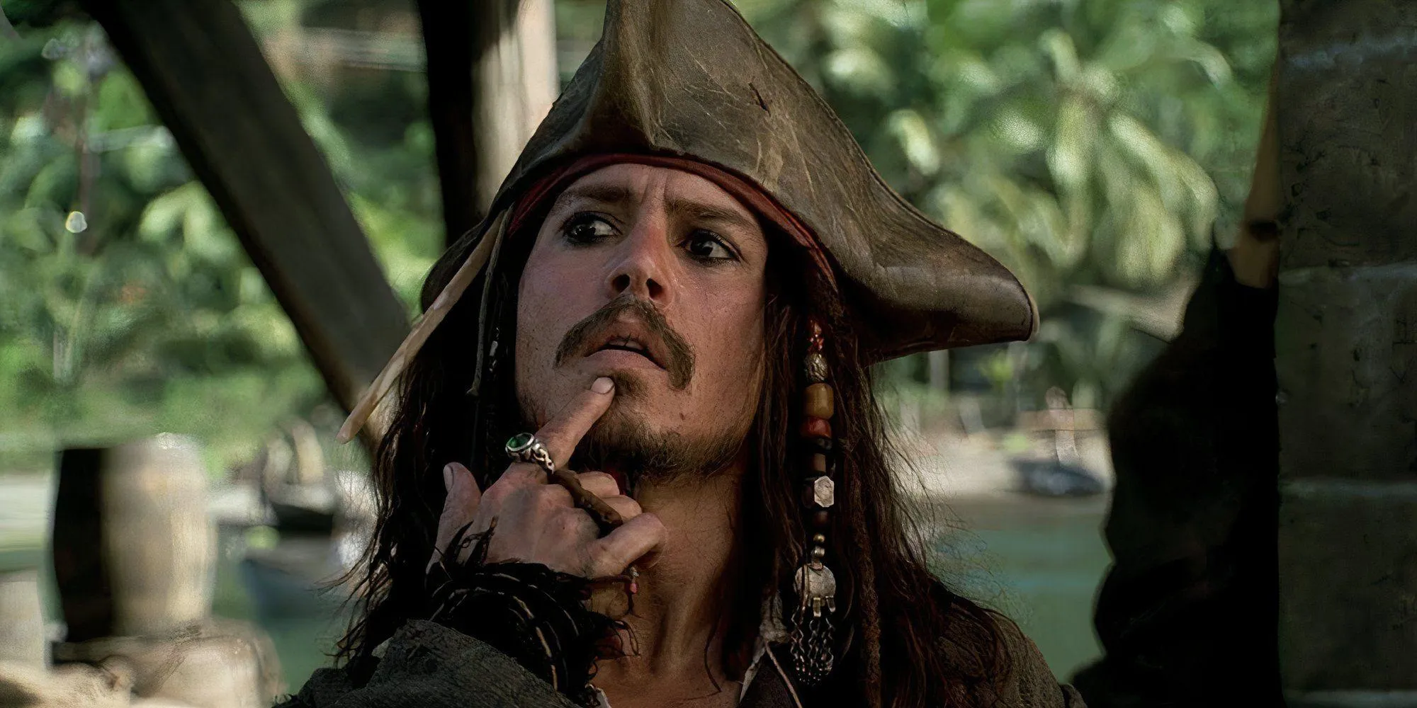 Jack Sparrow looking thoughtful, a figure you would want by your side if you had to take a risk.