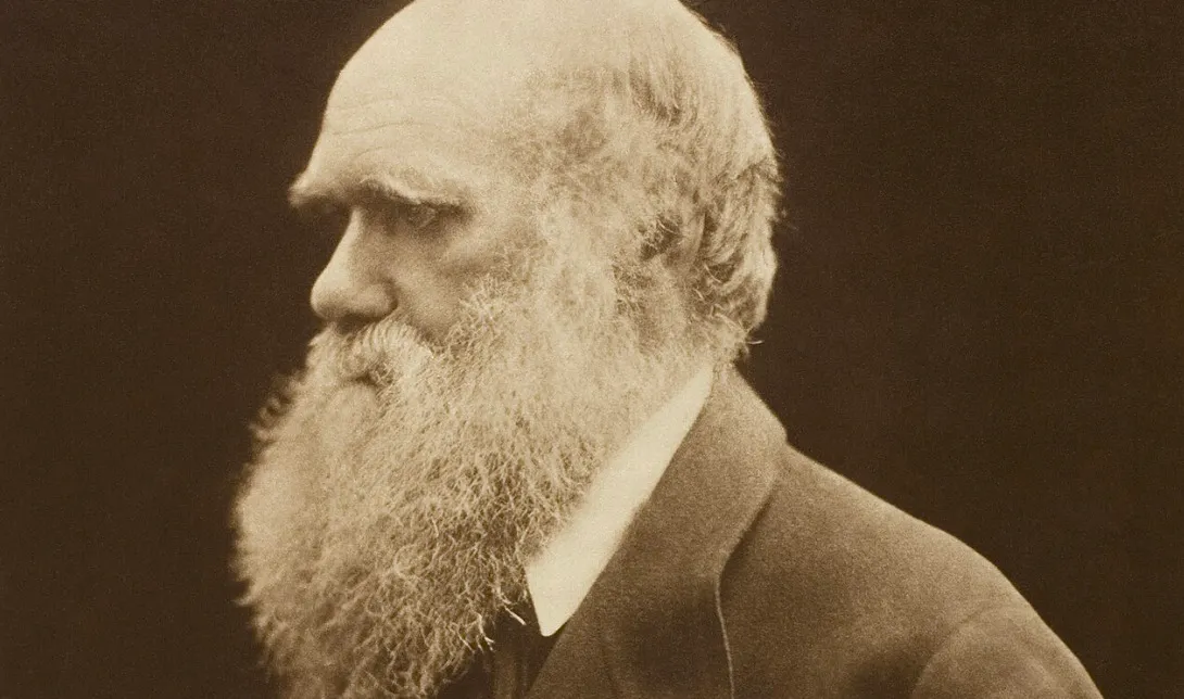 Sepia-toned portrait of Charles Darwin, a key figure in the Match The Answer To The Question series.