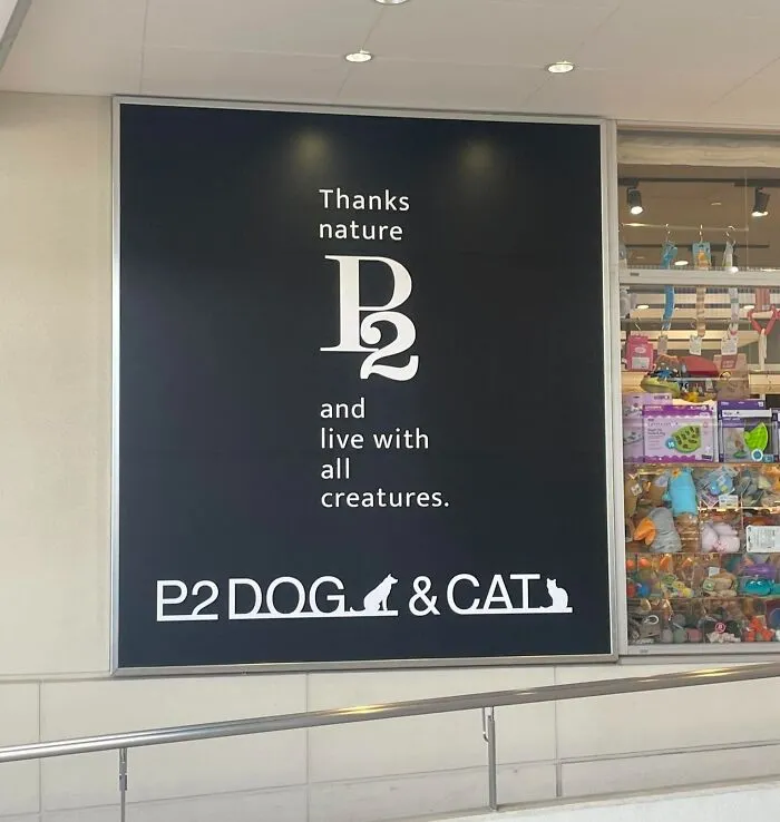 Hilarious example of getting lost in translation: a large sign in Japan reads 'Thanks nature B and live with all creatures.' next to P2 DOG & CAT.