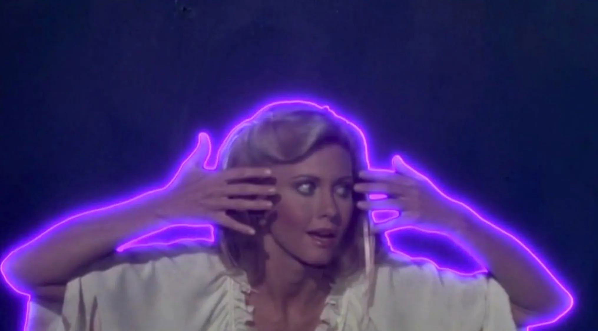 Olivia Newton-John in the 1980 musical film Xanadu, outlined in purple neon, 80s-90s music.