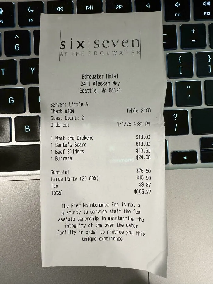 Restaurant bill from Six Seven at The Edgewater Hotel showing a large party gratuity. End tipping culture discussions.