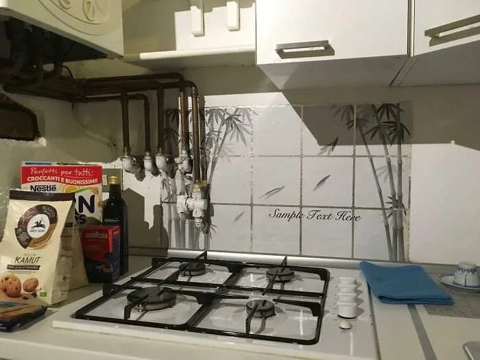 A messy kitchen with exposed pipes above the stove, an Airbnb blunder that might have you booking a boring hotel room.