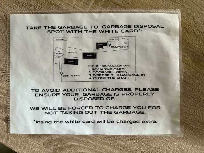 A printed sign detailing complex garbage disposal instructions for an Airbnb guest, highlighting potential additional charges.