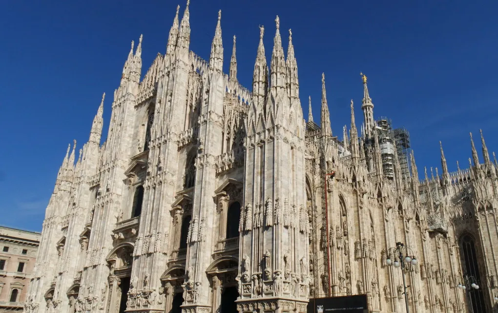 The Milan Cathedral, a magnificent heritage Gothic cathedral in Milan, Italy, featuring countless spires and statues.