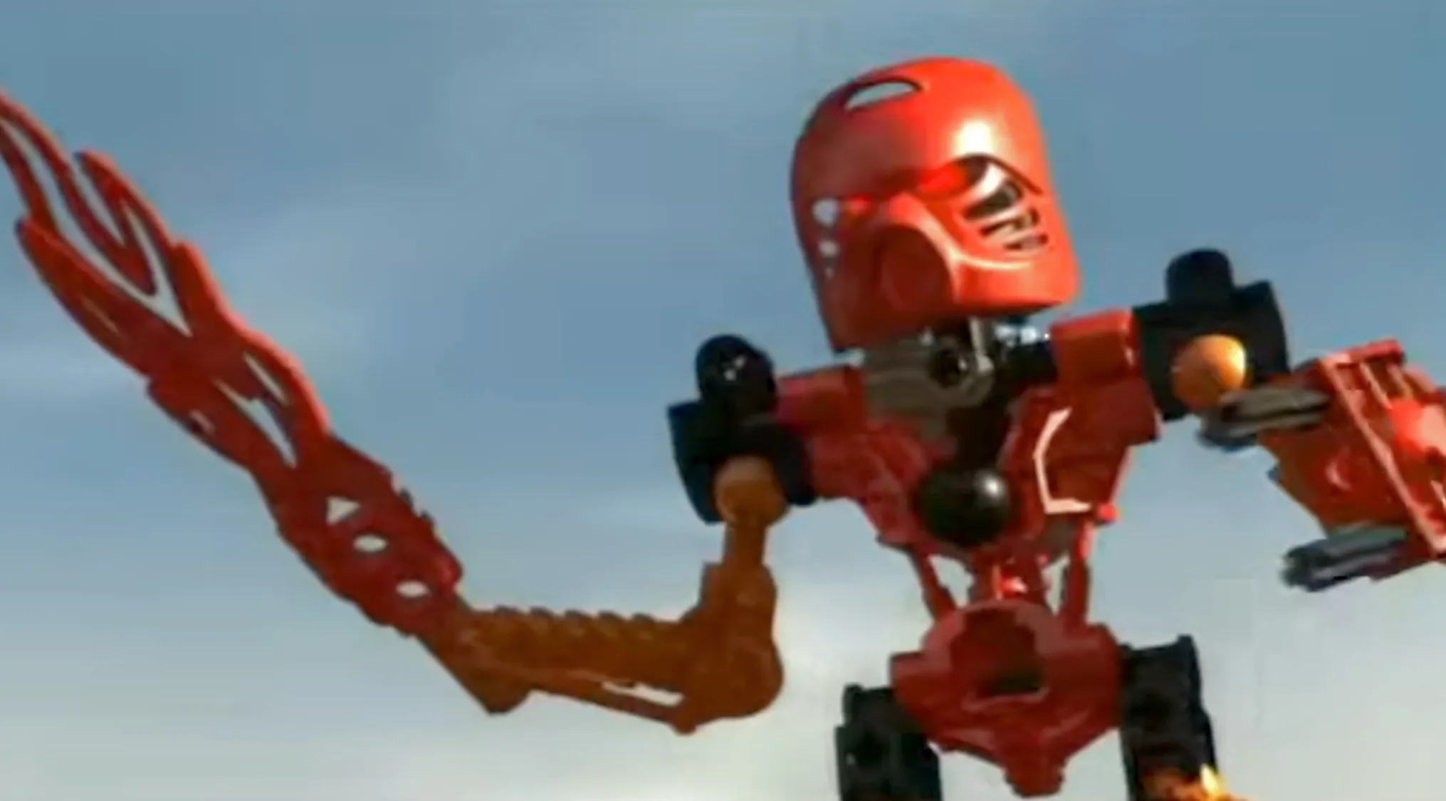 A red Bionicle, a buildable action figure with an elemental mask, from LEGOs 2000s pop culture series.