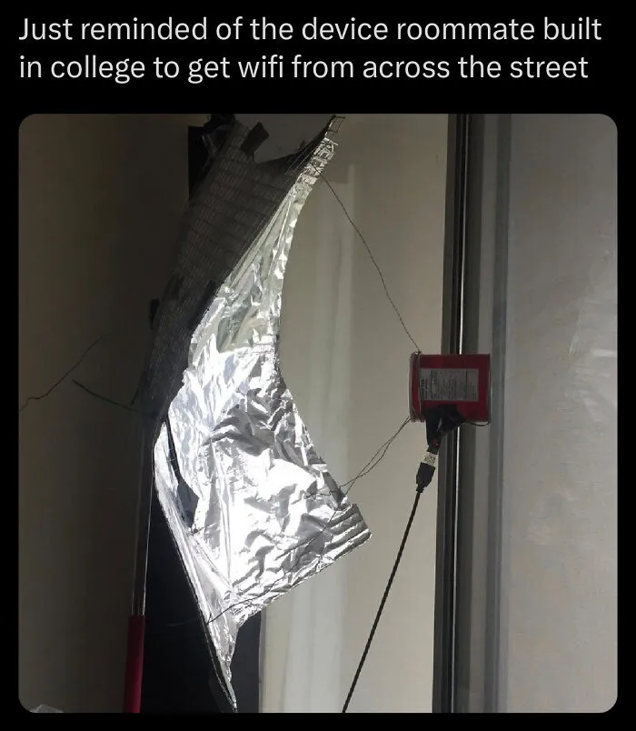 A DIY device made of foil and a can to fix something by boosting wifi signal across the street.