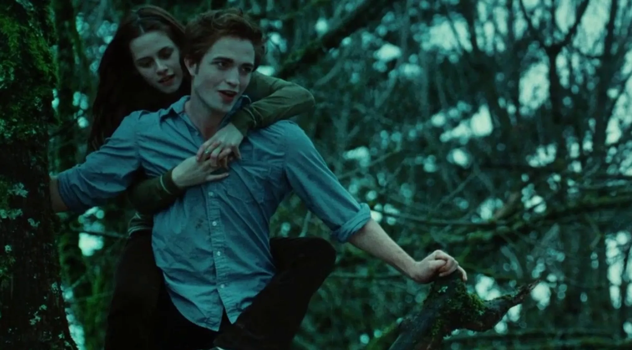 Bella and Edward from the Twilight movie franchises in a tree, an Odd One Out movie subtitle.