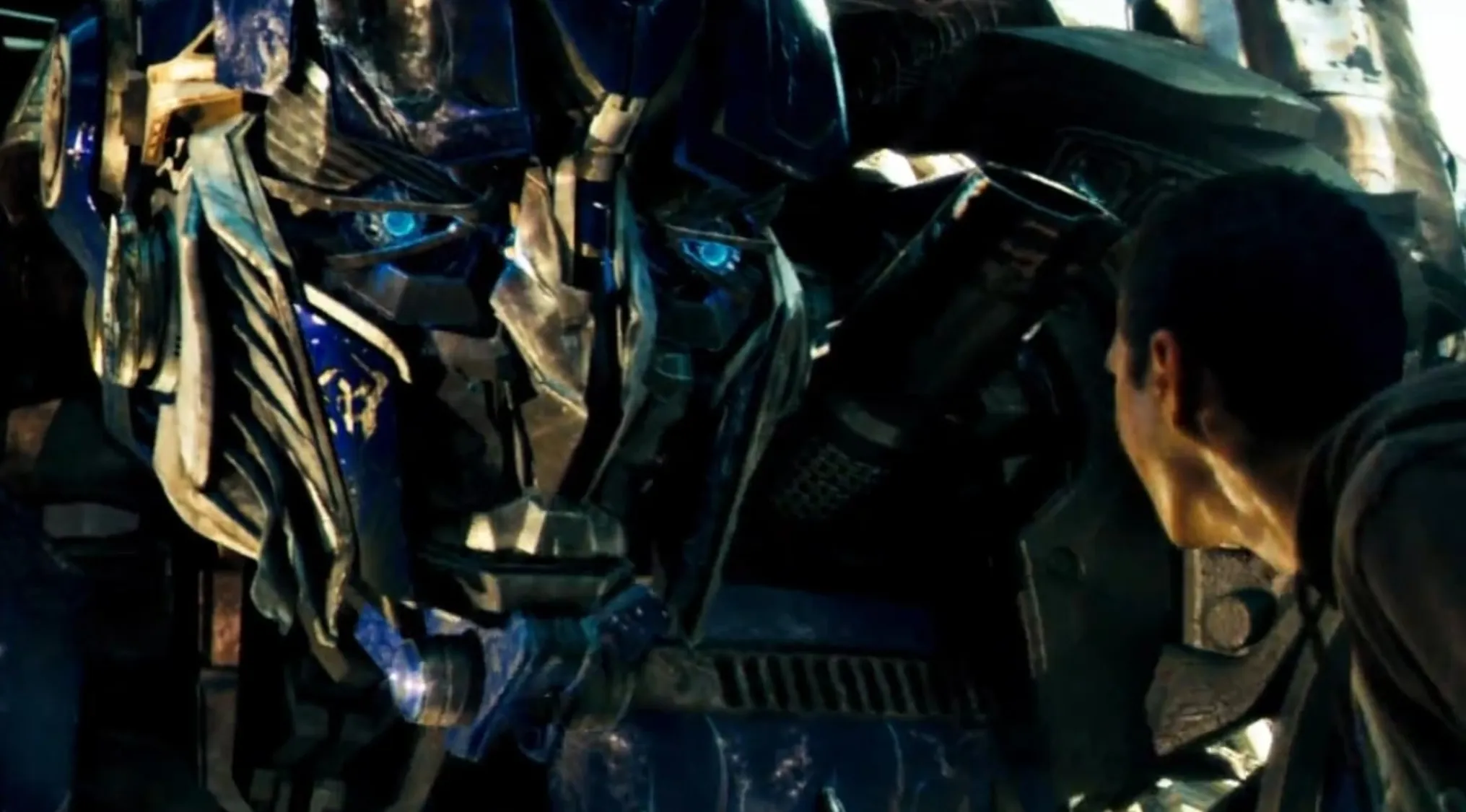 Optimus Prime face to face with a person from the Transformers movie franchises, an Odd One Out movie subtitle.