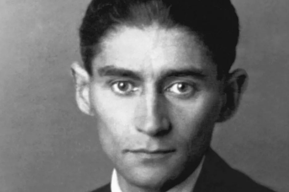 A black and white photo of Franz Kafka, an author who did not win a Nobel Prize in Literature.