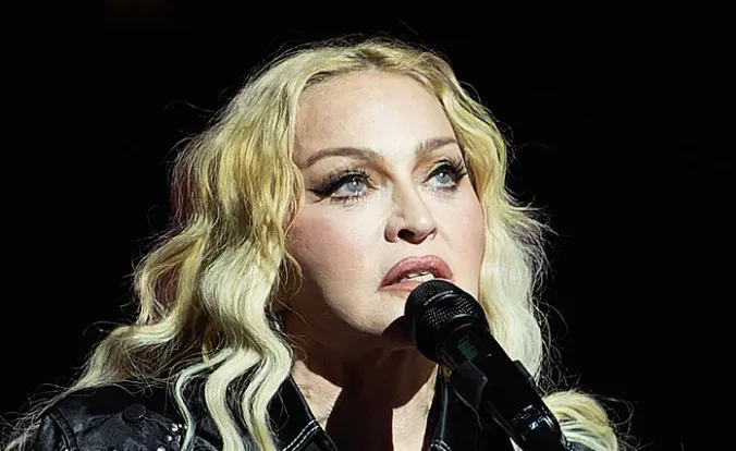 Madonna, a singer whose real name is not Stefani Joanne Angelina Germanotta.