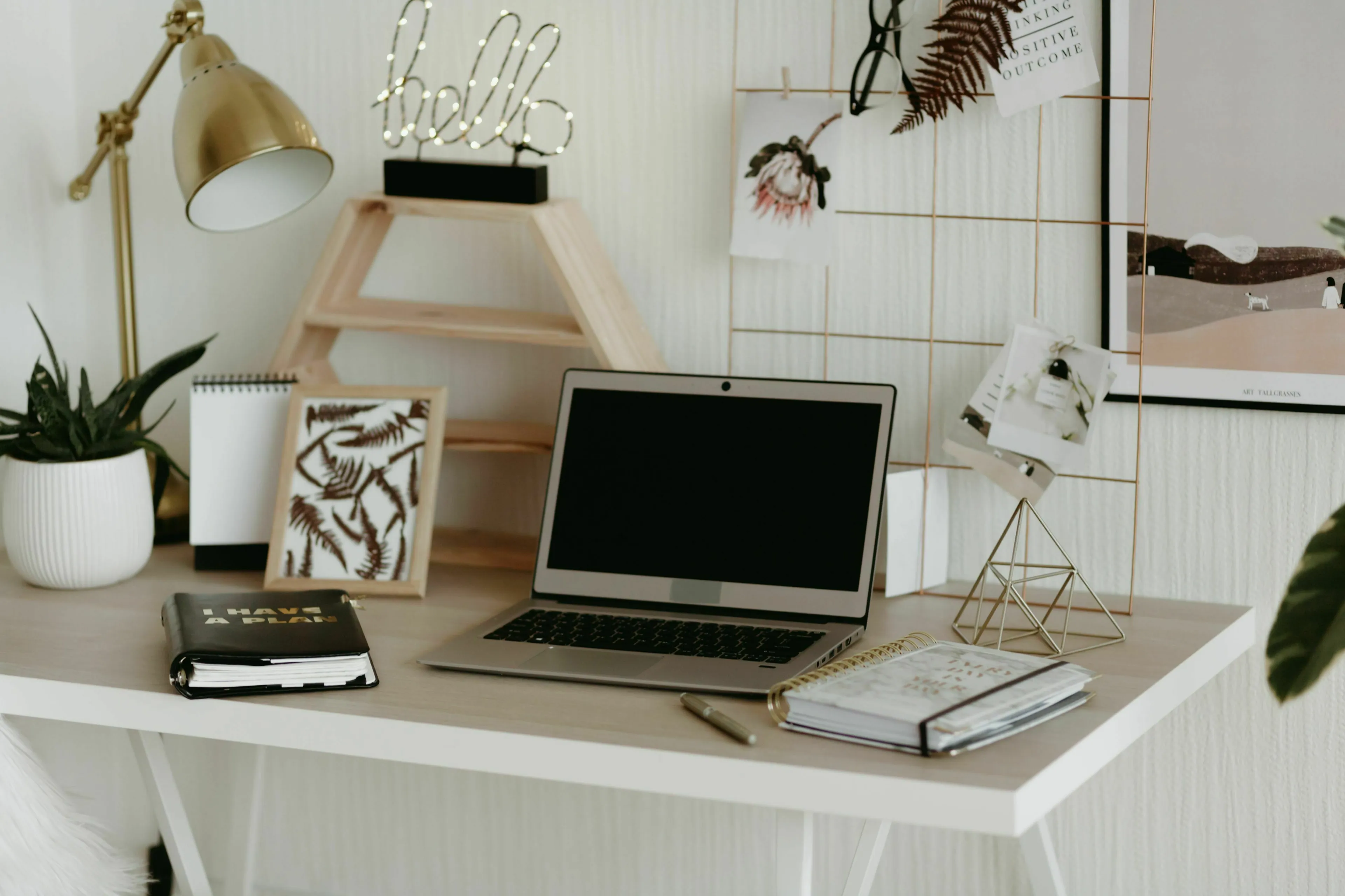A neat desk with a laptop and organized items, reflecting a possible stress response type.