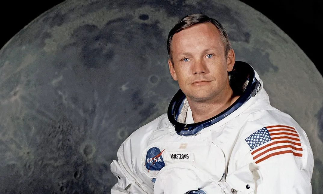 Astronaut Neil Armstrong stands in a spacesuit with the moon in the background for a pub trivia quiz.