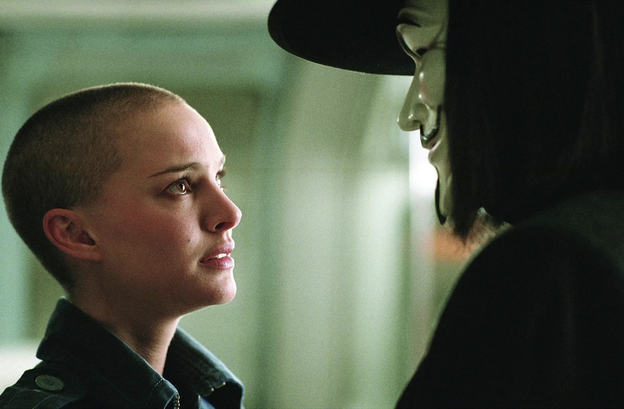Evey Hammond looks at V in the iconic V for Vendetta movie scene. Pick a movie for tonight.