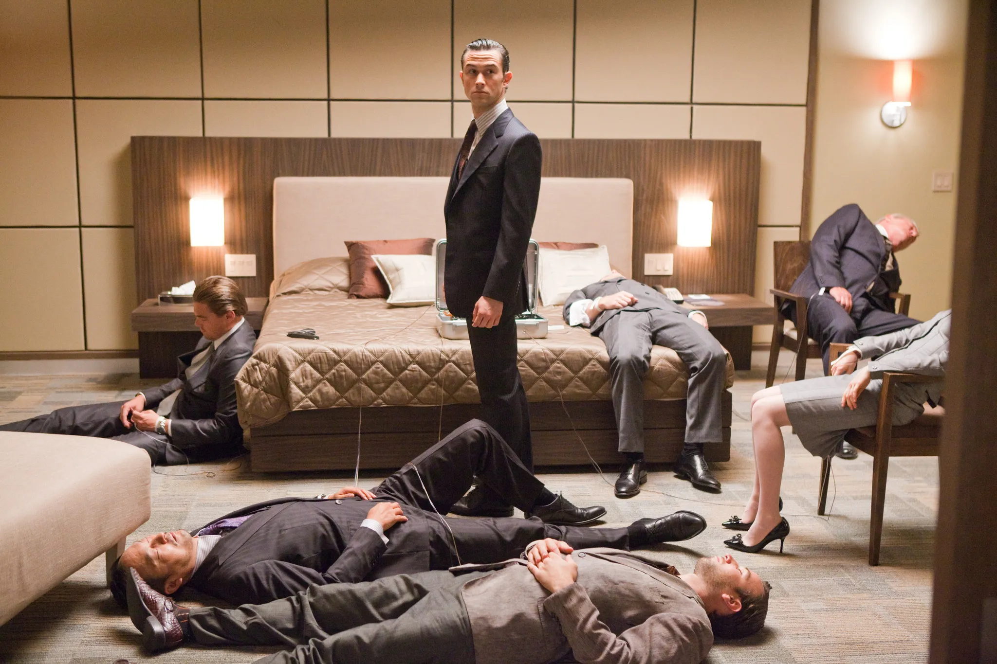 Arthur stands amidst the zero-gravity hotel hallway in the movie Inception. Pick a movie for tonight.