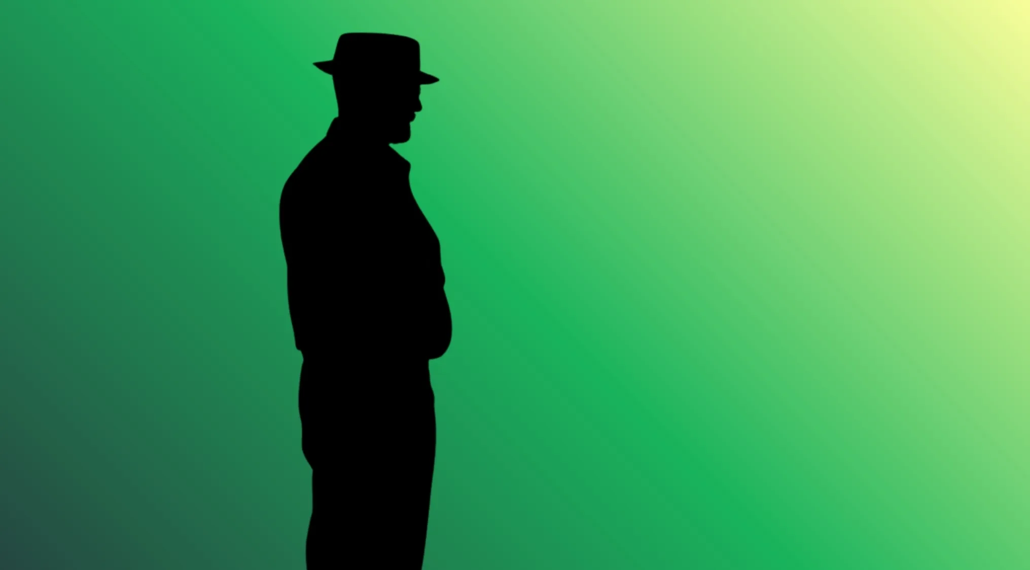 Silhouette of a male character with a fedora hat against a green background.