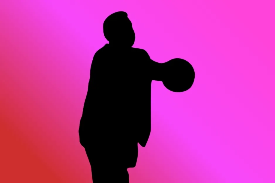 Silhouette of Kevin Malone holding a basketball against a vibrant pink background.