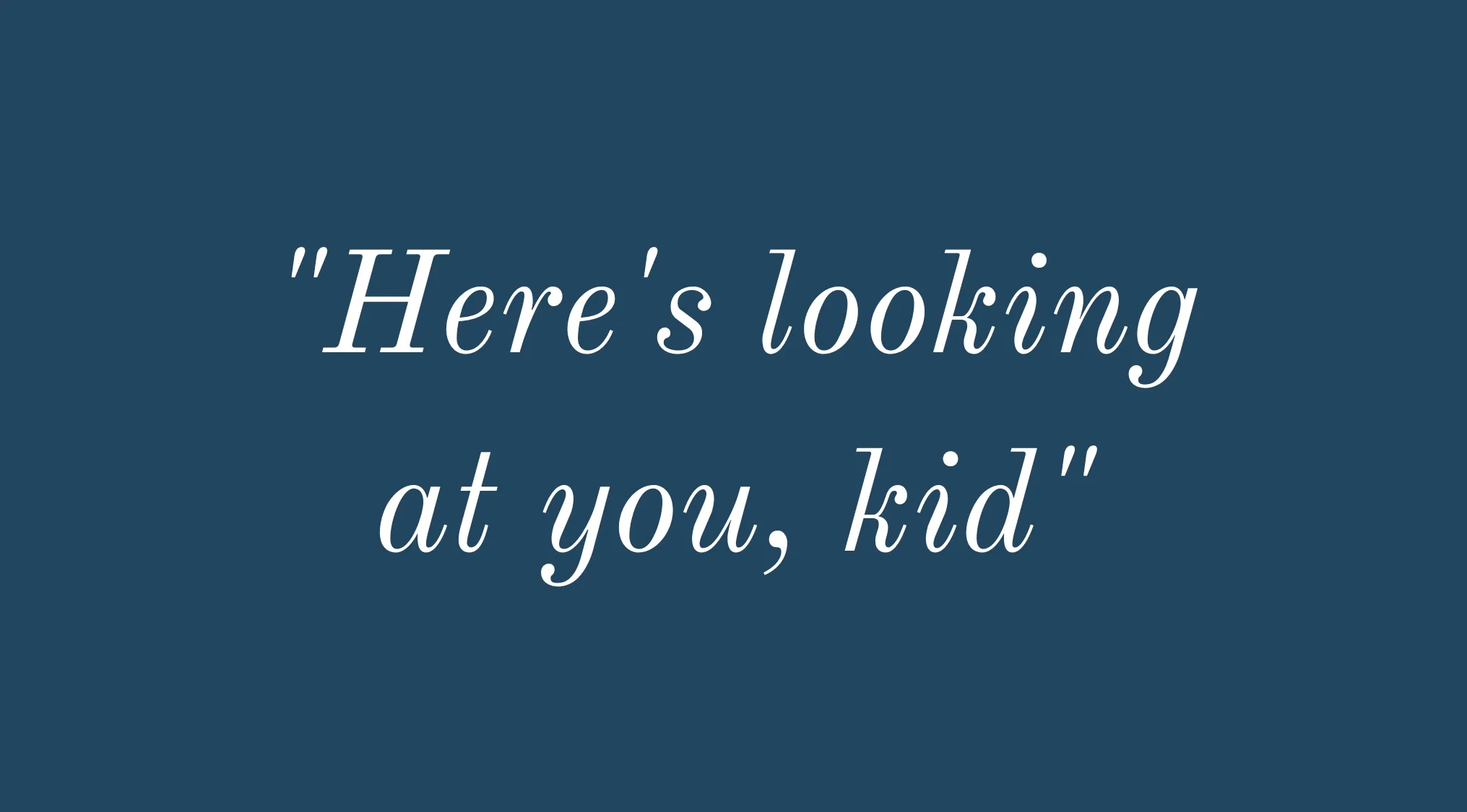 The quote Here's looking at you, kid? written in white script on a dark blue background for a pub trivia quiz.