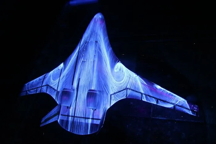 A Futuristic Hybrid Wing Body During Tests In The Wind Tunnel At NASA's Langley Research Center. The Patterns Are Formed By Air Movement Over The Fluorescent Oil Sprayed Onto The Wings