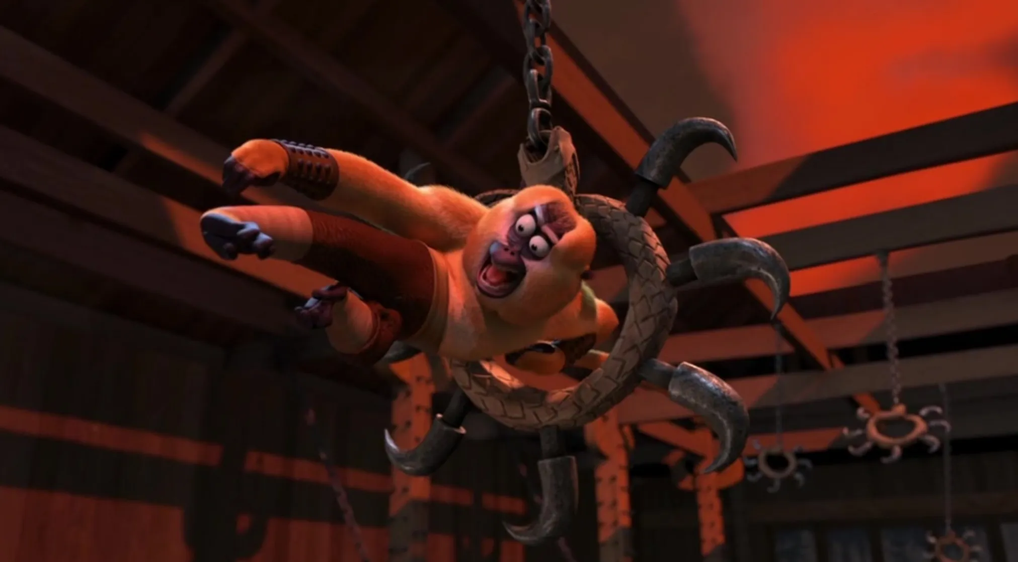 Jeopardy Quiz Celebrities: Monkey from Kung Fu Panda caught in a trap, looking scared with wide eyes and open mouth.