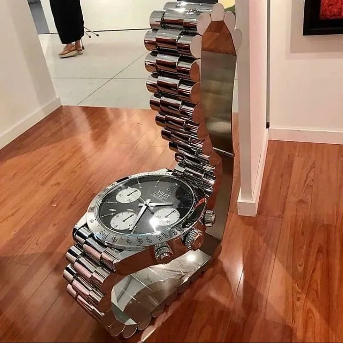 A giant wristwatch shaped into a chair, an example of bizarre furniture design.